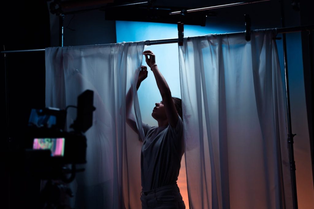 Woman Standing in Front of Camera
